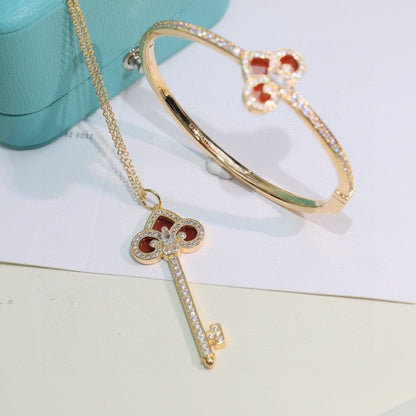 18K T Fleur De Lis Bracelet